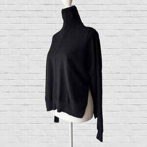 Wilfred Turtleneck Sweater with side slits